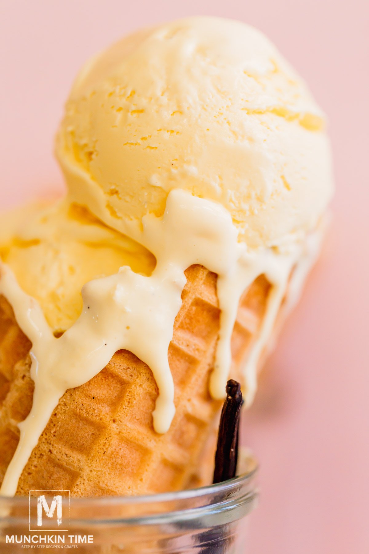 Homemade vanilla bean ice cream in a waffle cone.