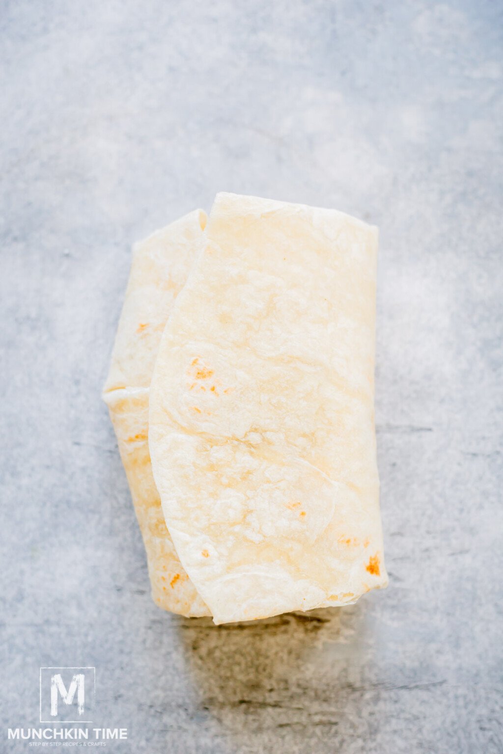 Quick and Easy Bacon Egg and Cheese Breakfast Burrito - Munchkin Time