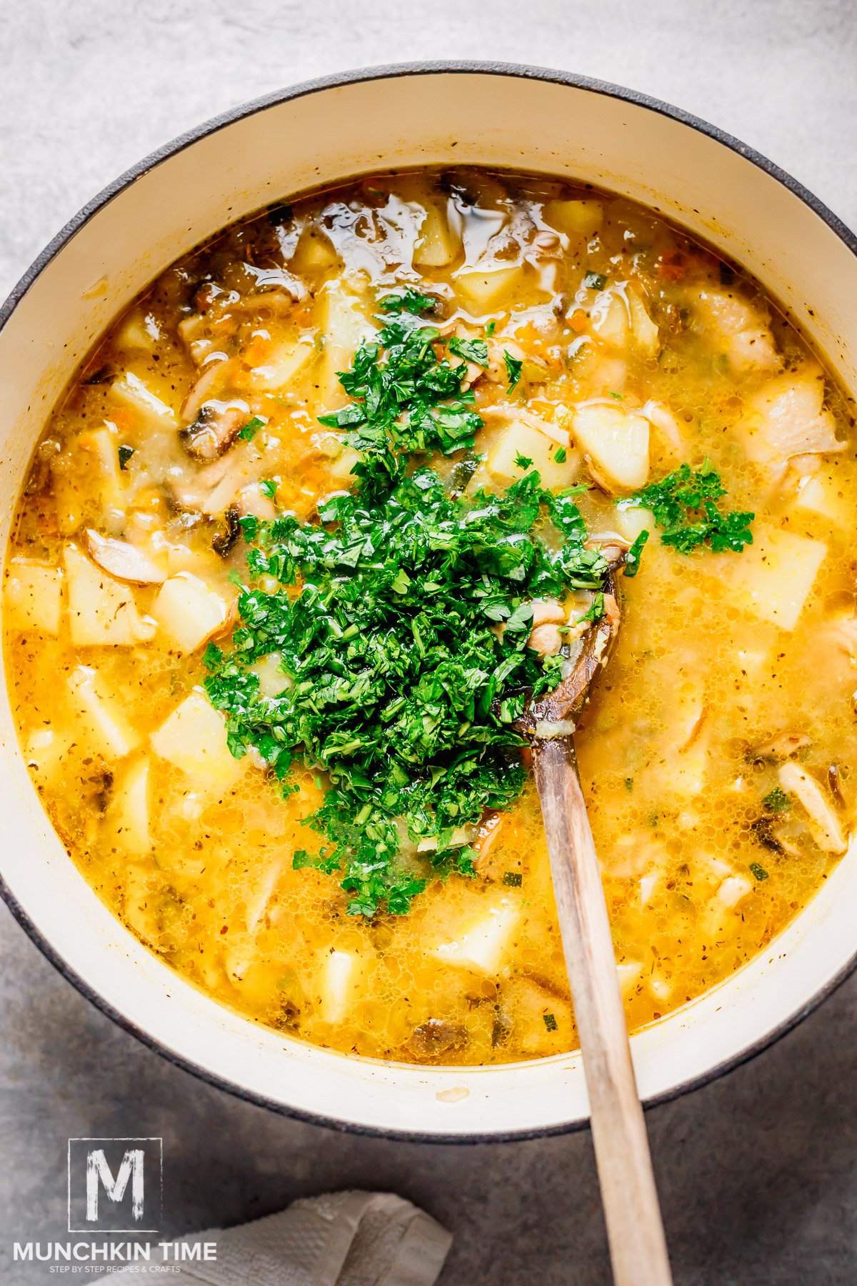 Finely chopped parsley added to the pot with the chicken potato stew.