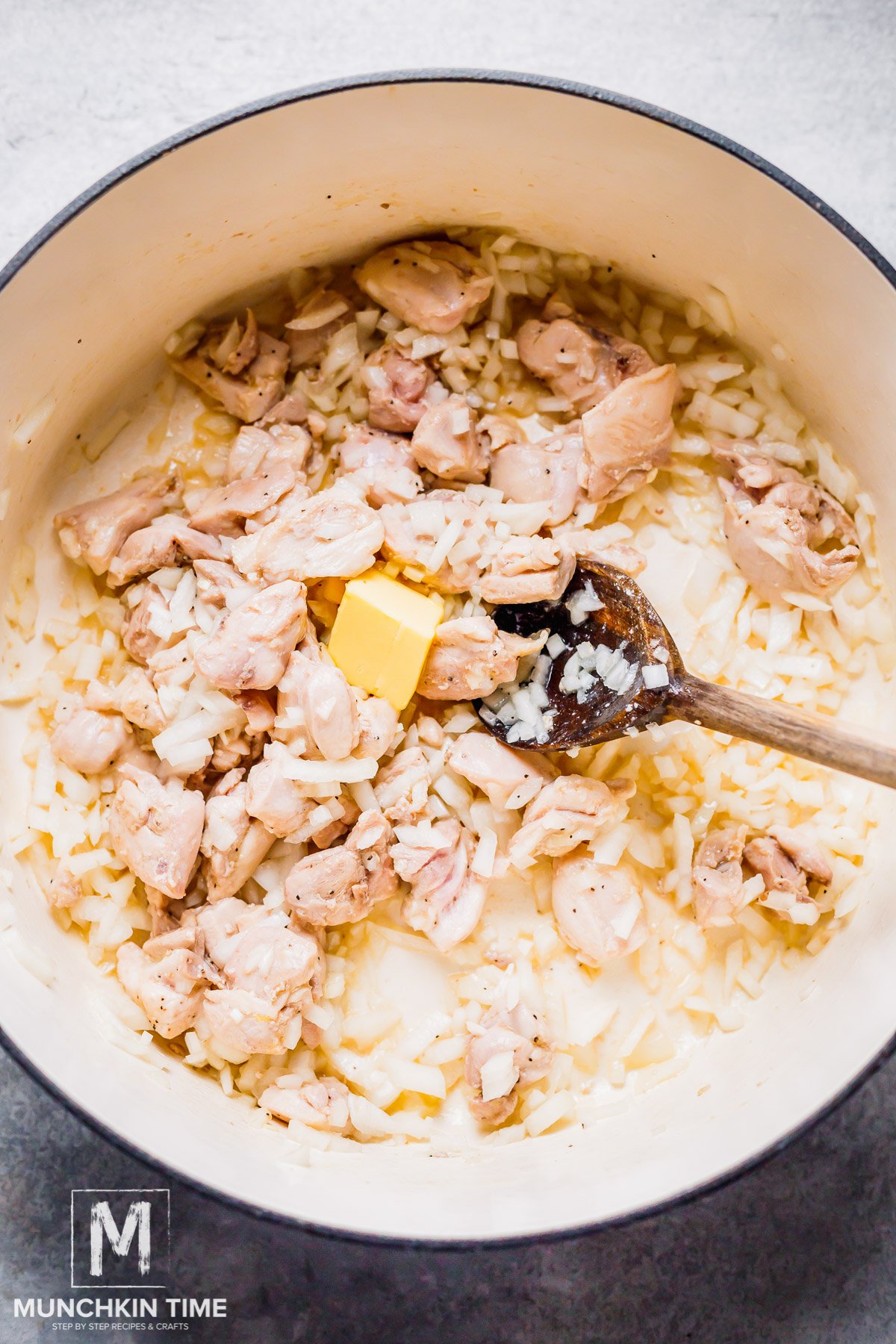 onion and butter added to the cooked chicken.