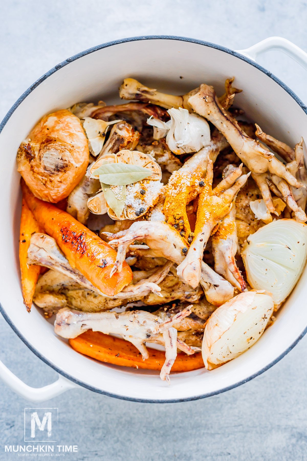 roasted veggies and chicken bones added to the pot.