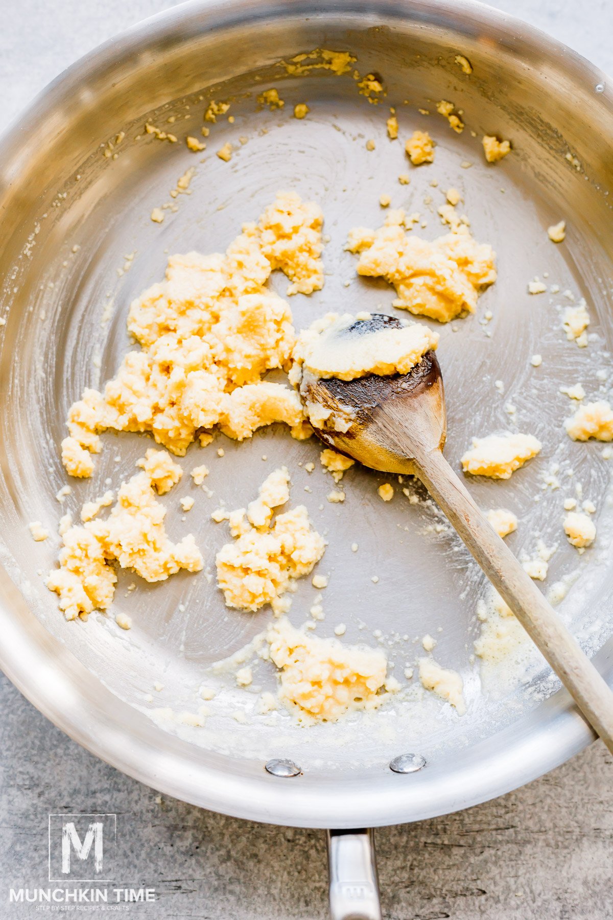 flour mixed with butter in the skillet cooking.