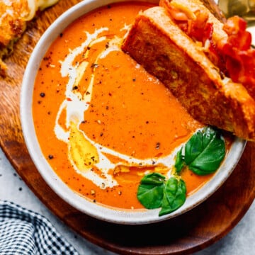 Creamy Tomato Bisque Soup with bacon grilled cheese sandwich. 