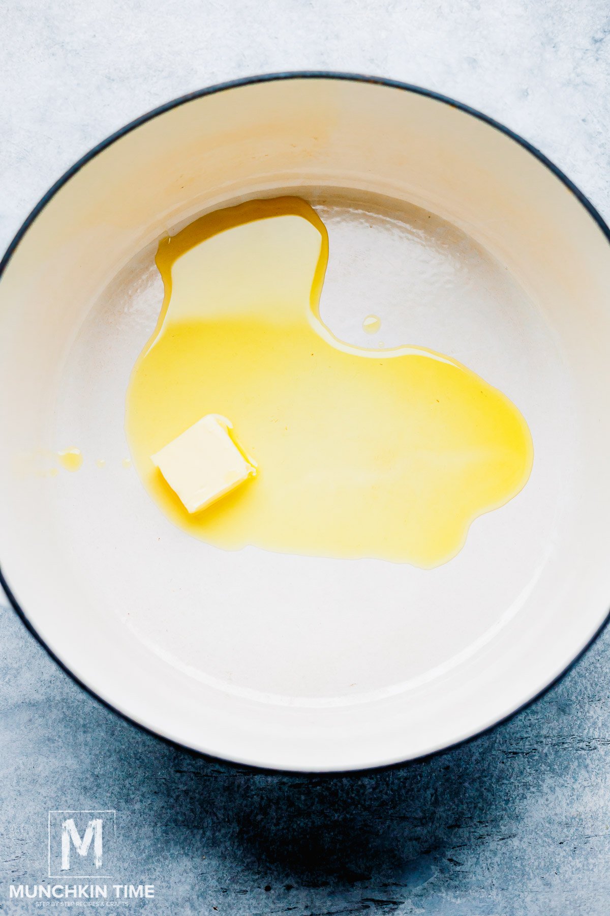 butter melting in a dutch oven pot.