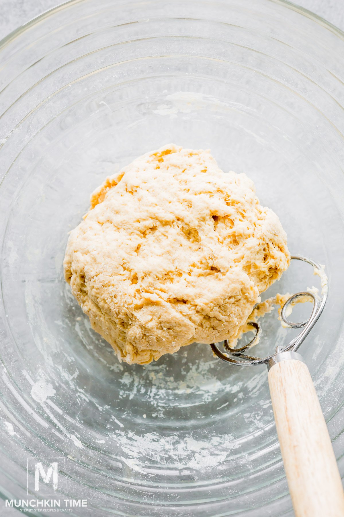 bread dough is formed in a bowl.
