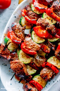 closer shot of grilled Beef Kebabs on a platter.