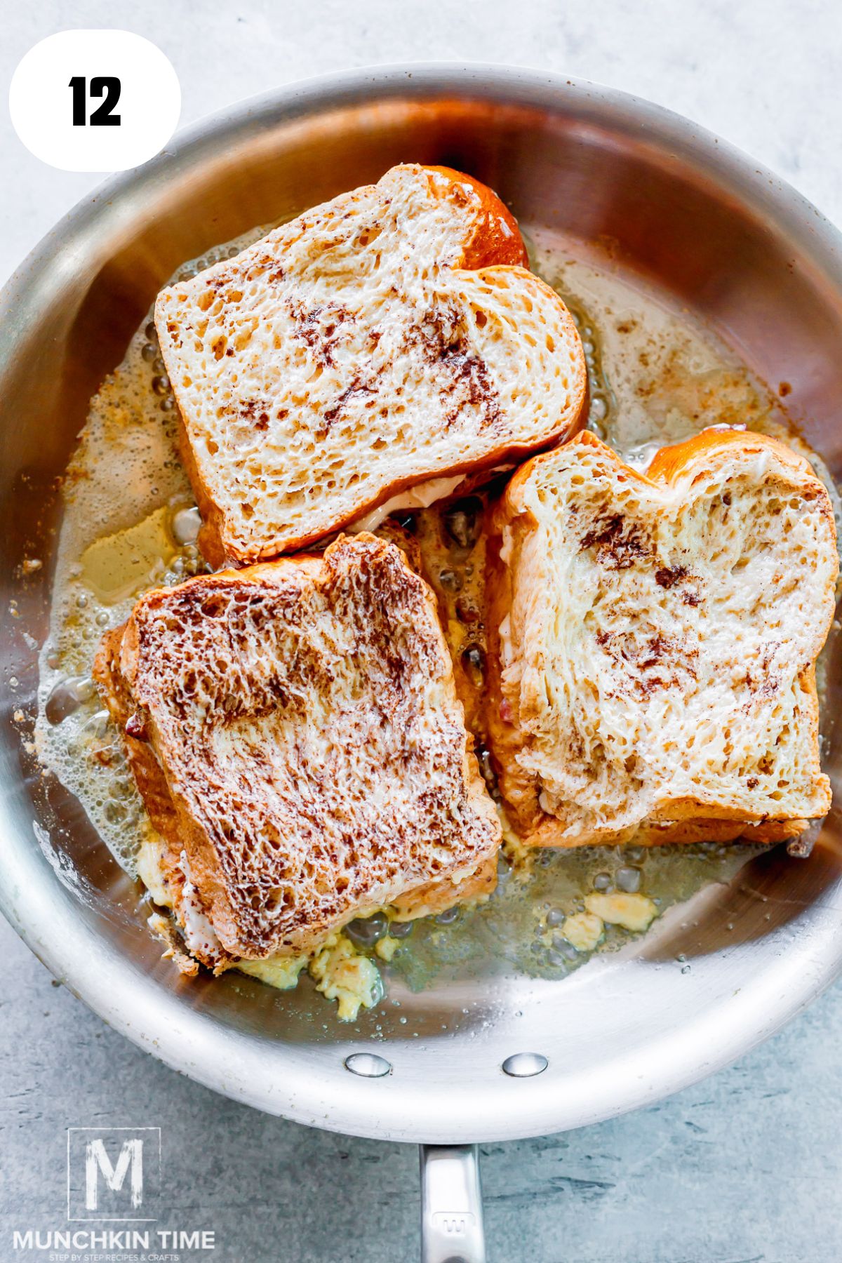 french toast added to the skillet with butter.