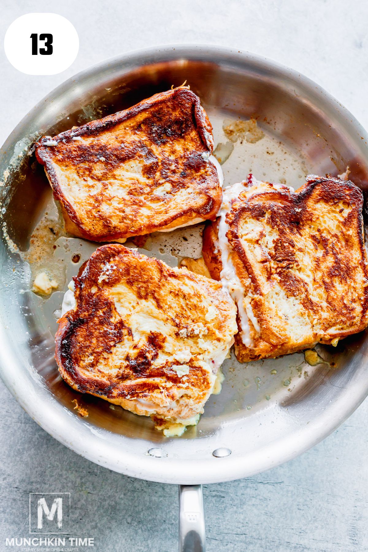 french toast flipped onto the other side in the skillet.