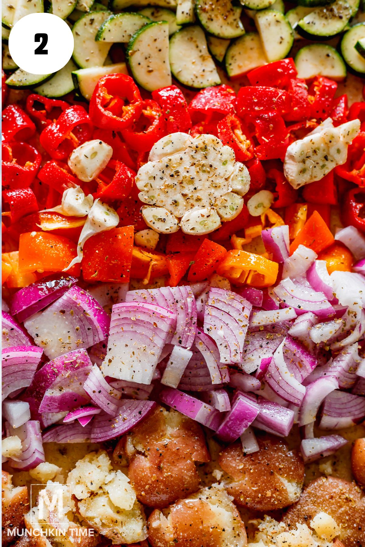 seasoned veggies on a baking sheet.