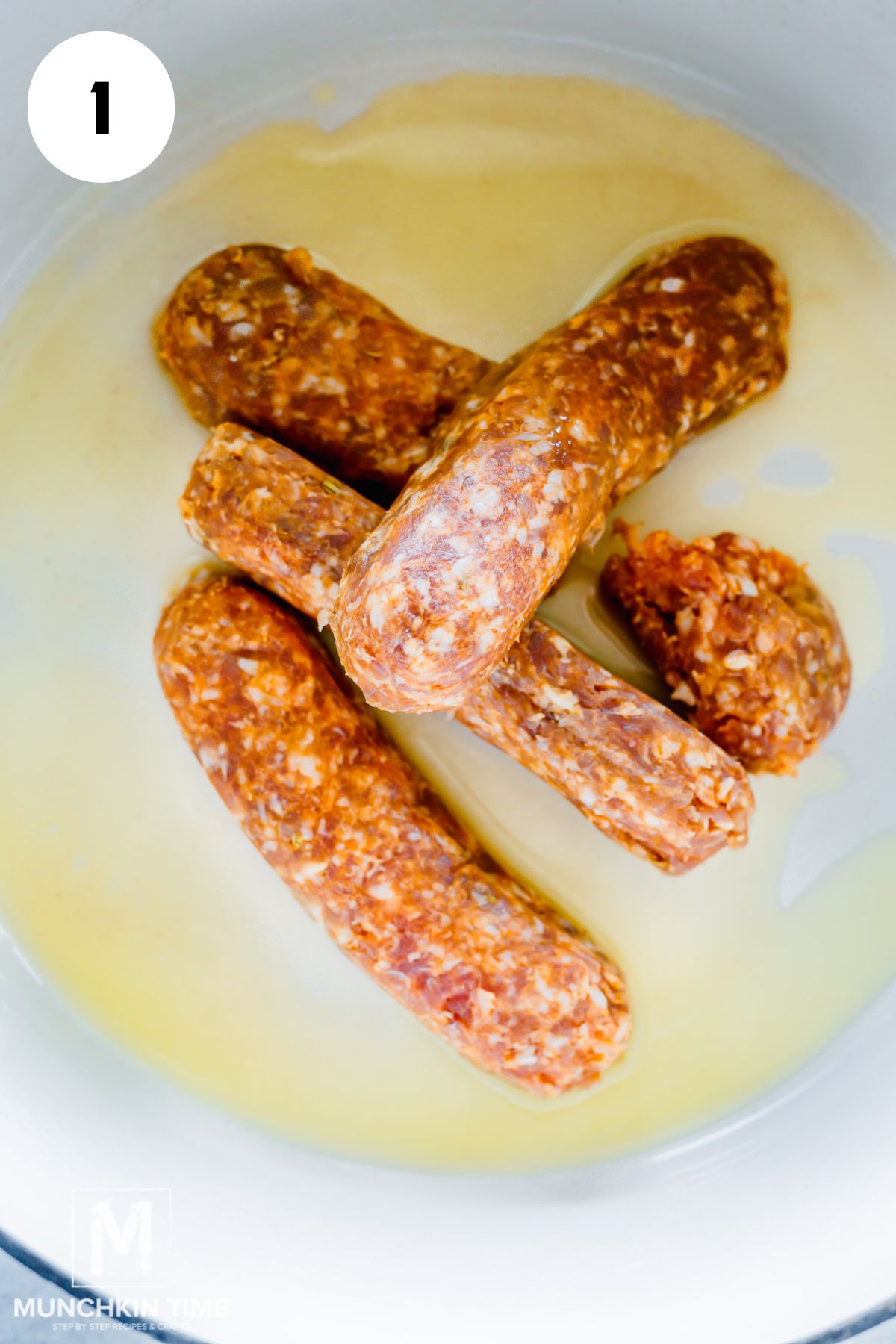 Italian sausage in a pot ready to be cooked.
