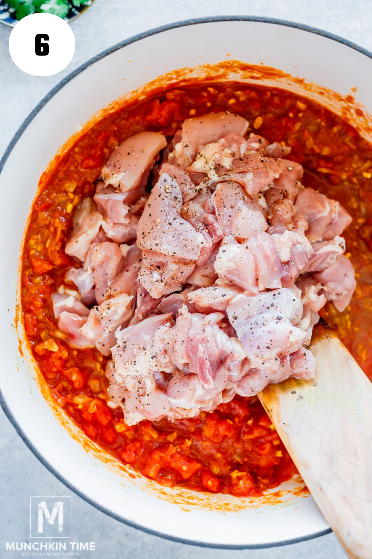 seasoned chicken added to the pot.