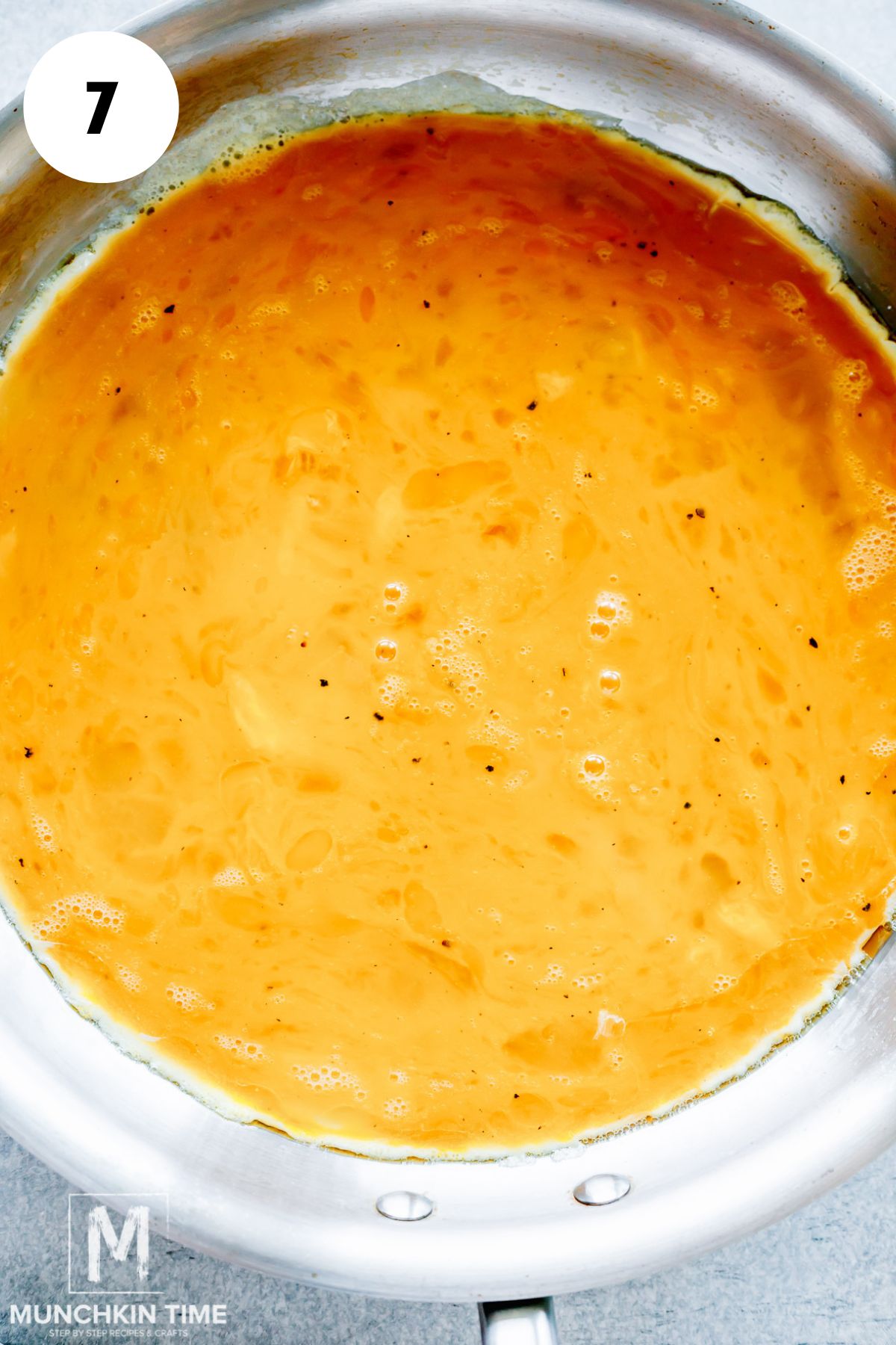 eggs cooking in the skillet.