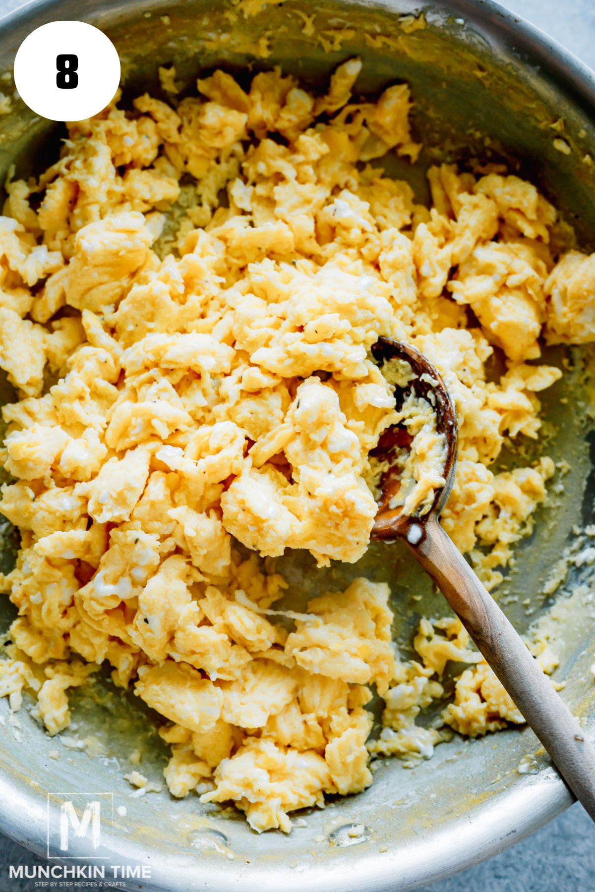 scrambled eggs in the skillet done cooking.