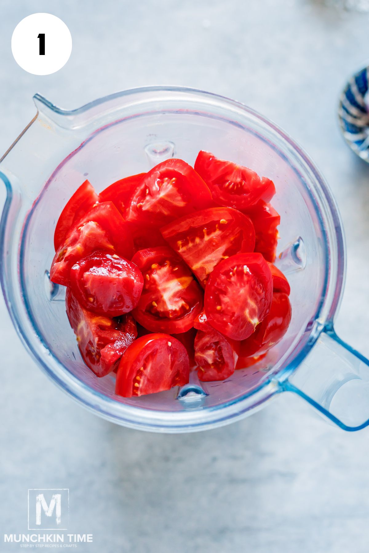 sliced tomatoes in a blender.