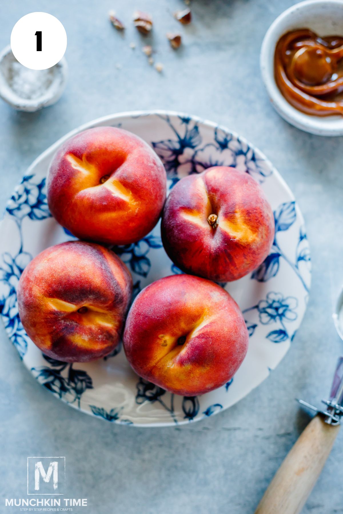 ripe peaches on a plate.
