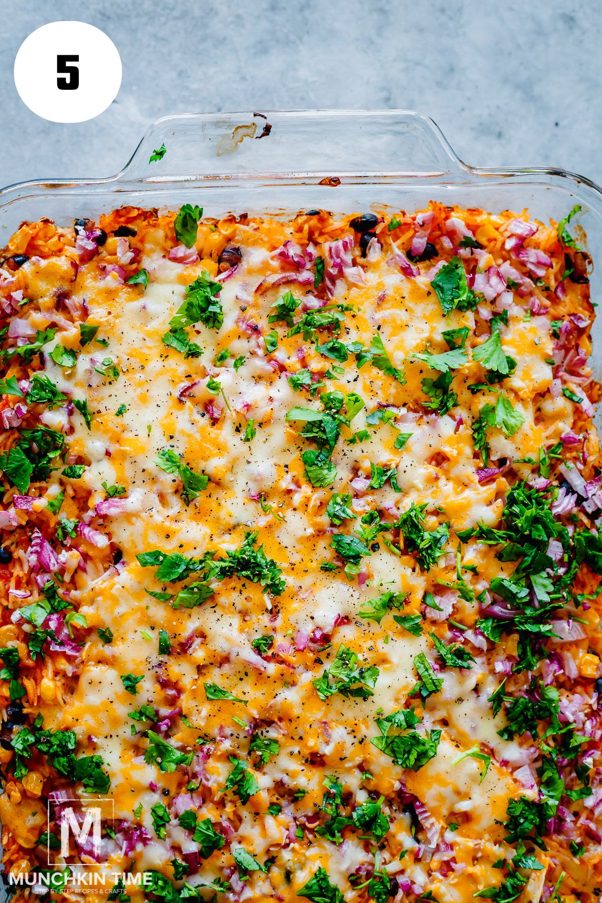 chicken and rice casserole garnished with fresh cilantro.