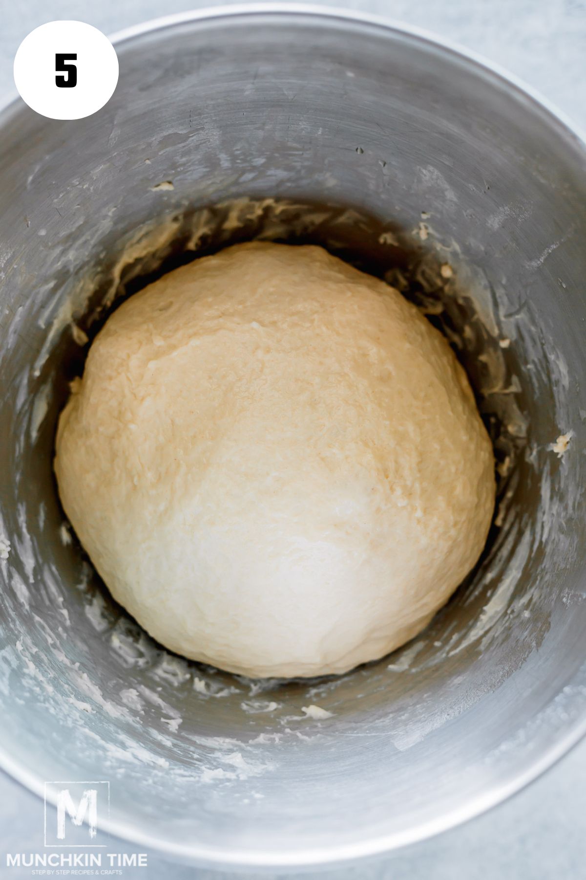  Once the dough is soft and elastic, cover the bowl with plastic wrap and let it sit at room temperature for 4-6 hours until it doubles in bulk.