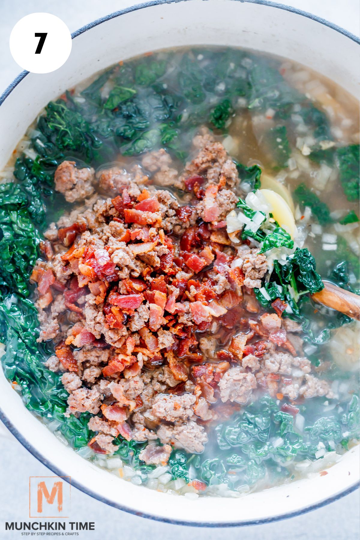 sausage, bacon and kale added to the pot.