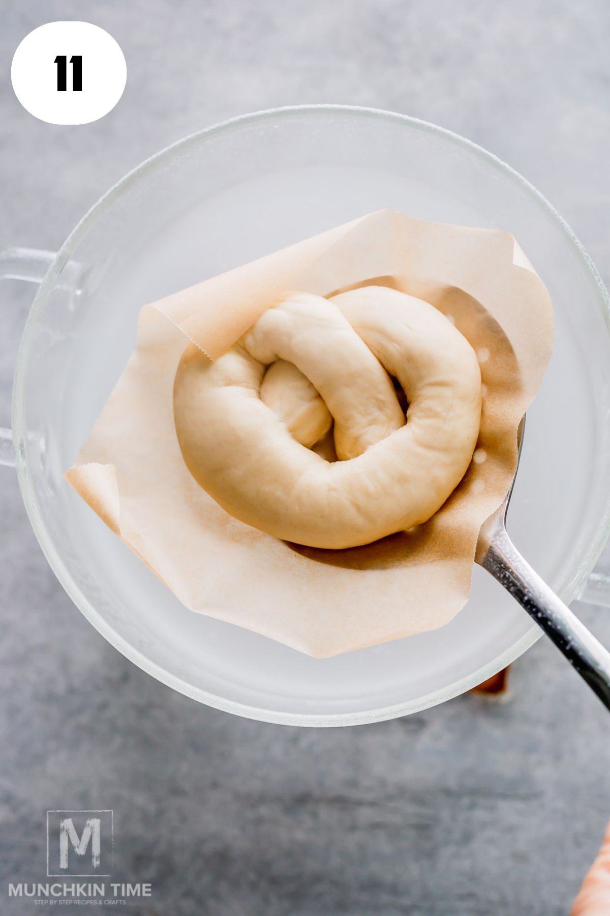 pretzel placed in water with baking soda.