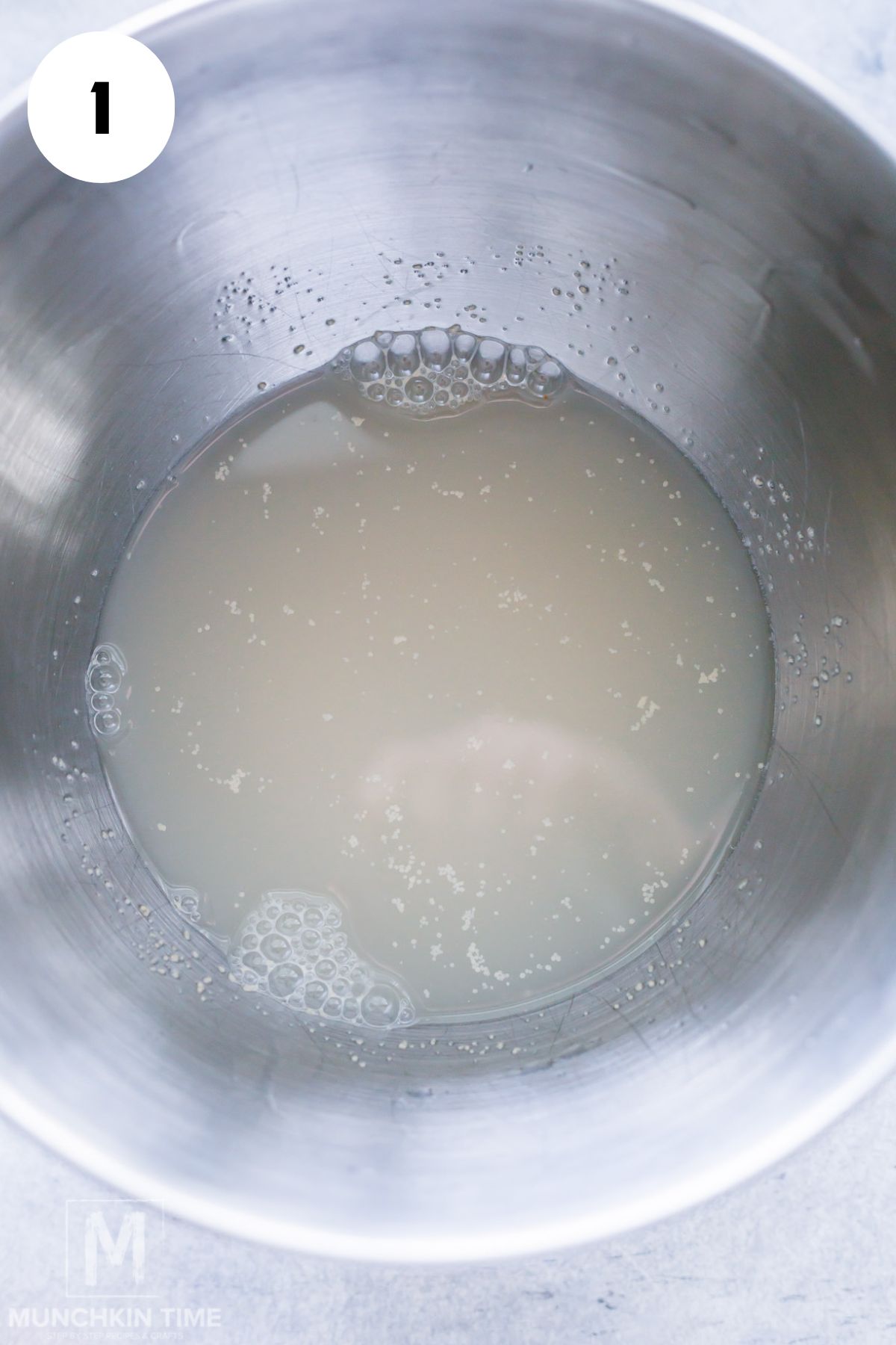 sugar, yeast and water in the bowl.
