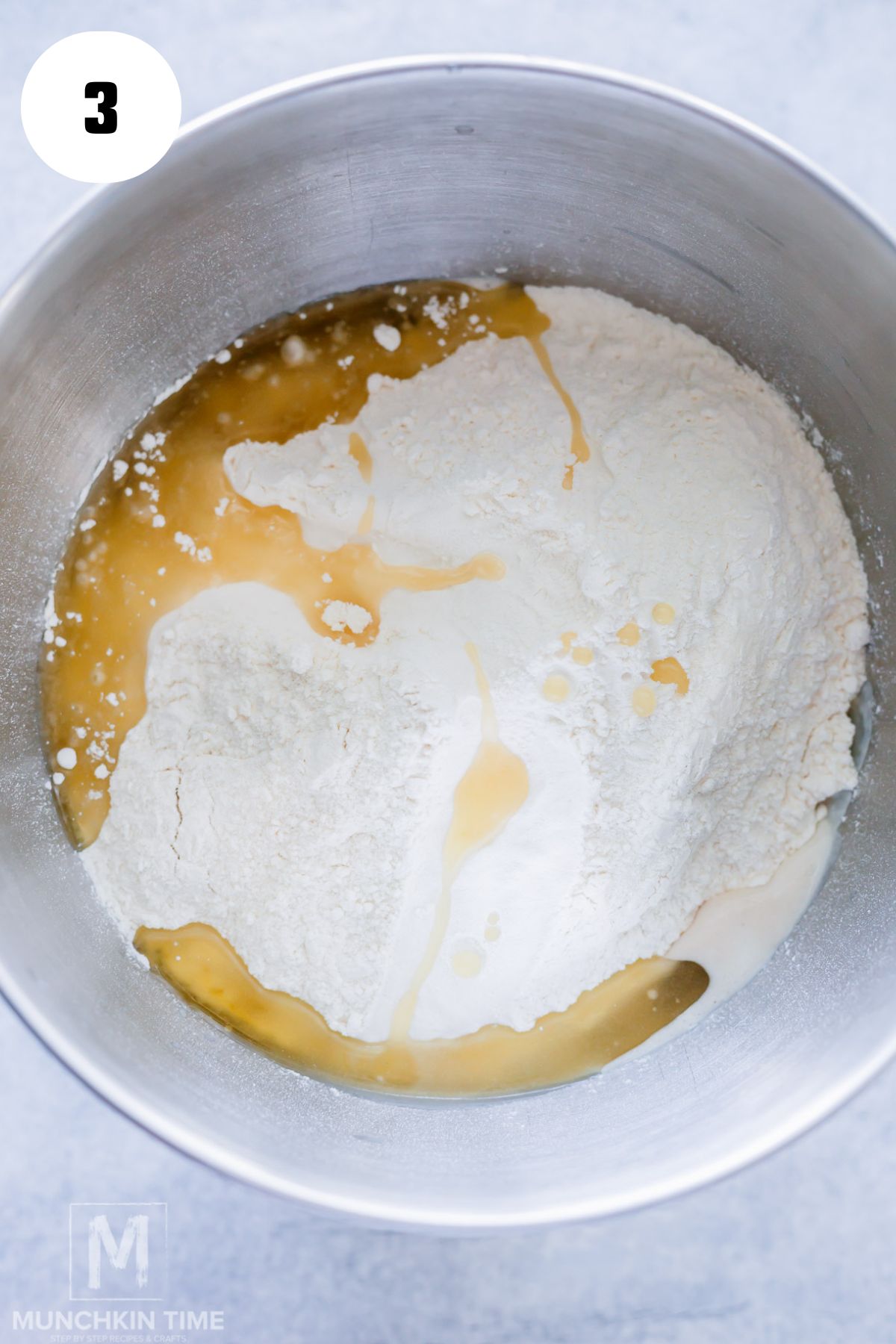 flour and oil added to the bowl.