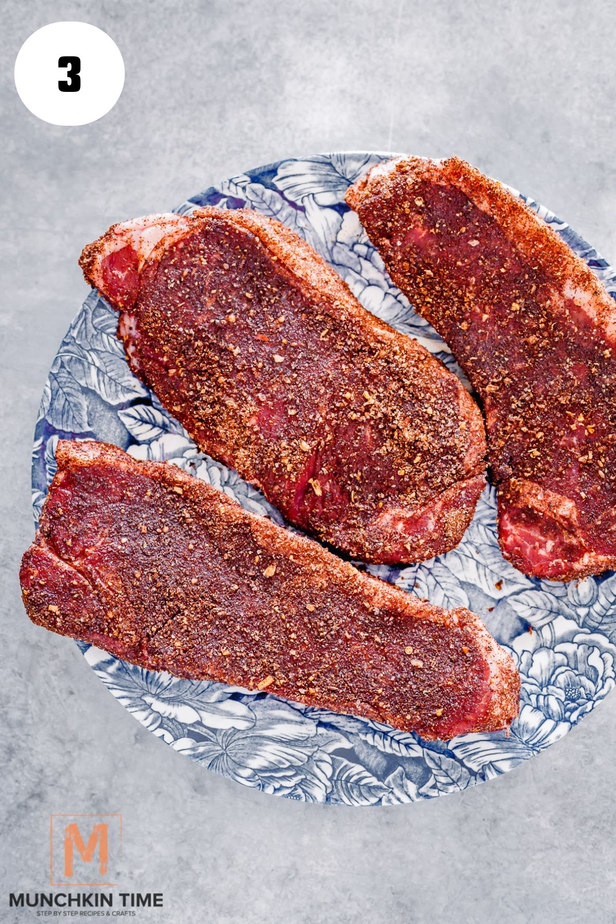 3 steaks rubbed with coffee rub.