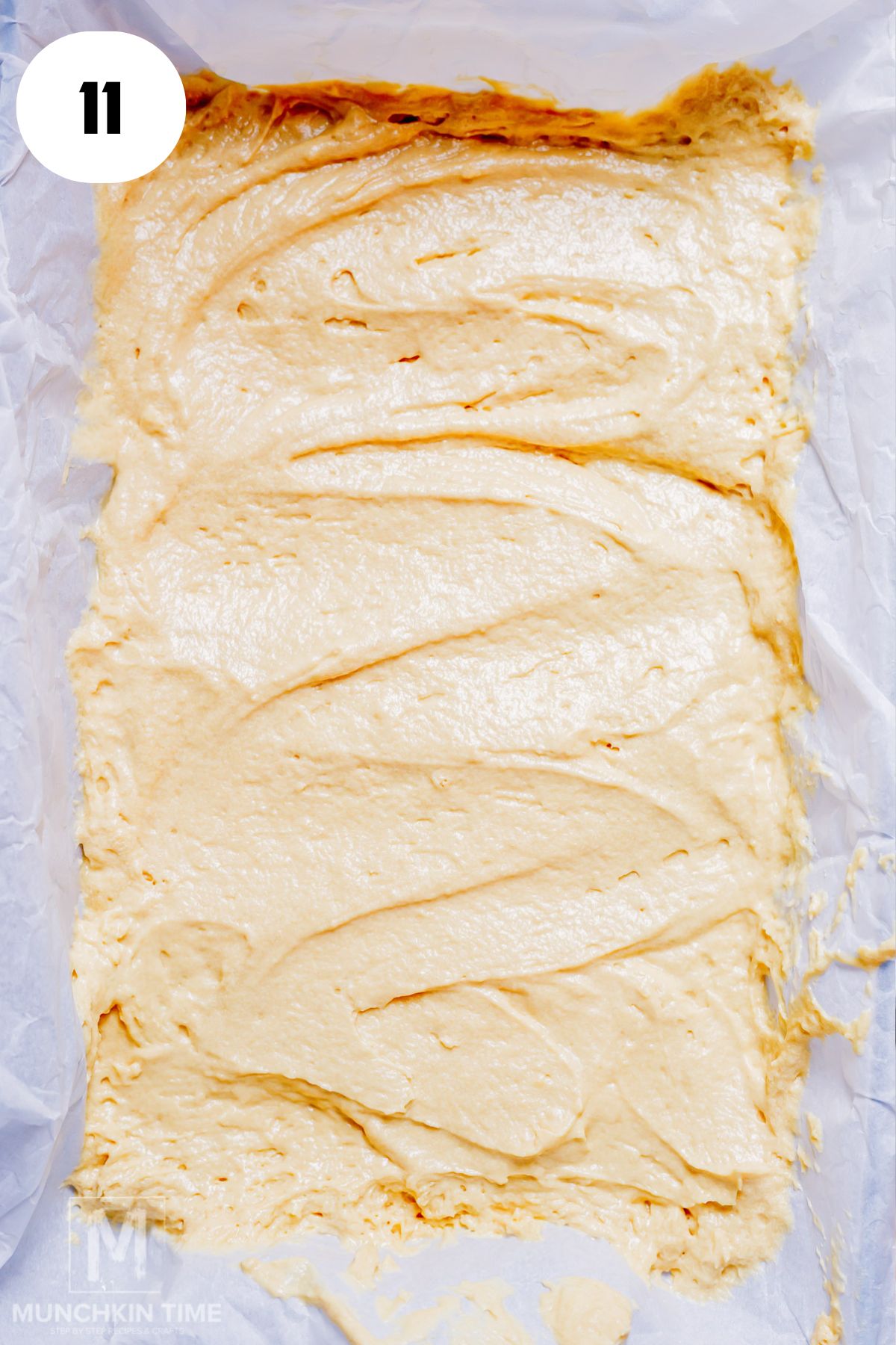 cake batter spread over the baking pan.