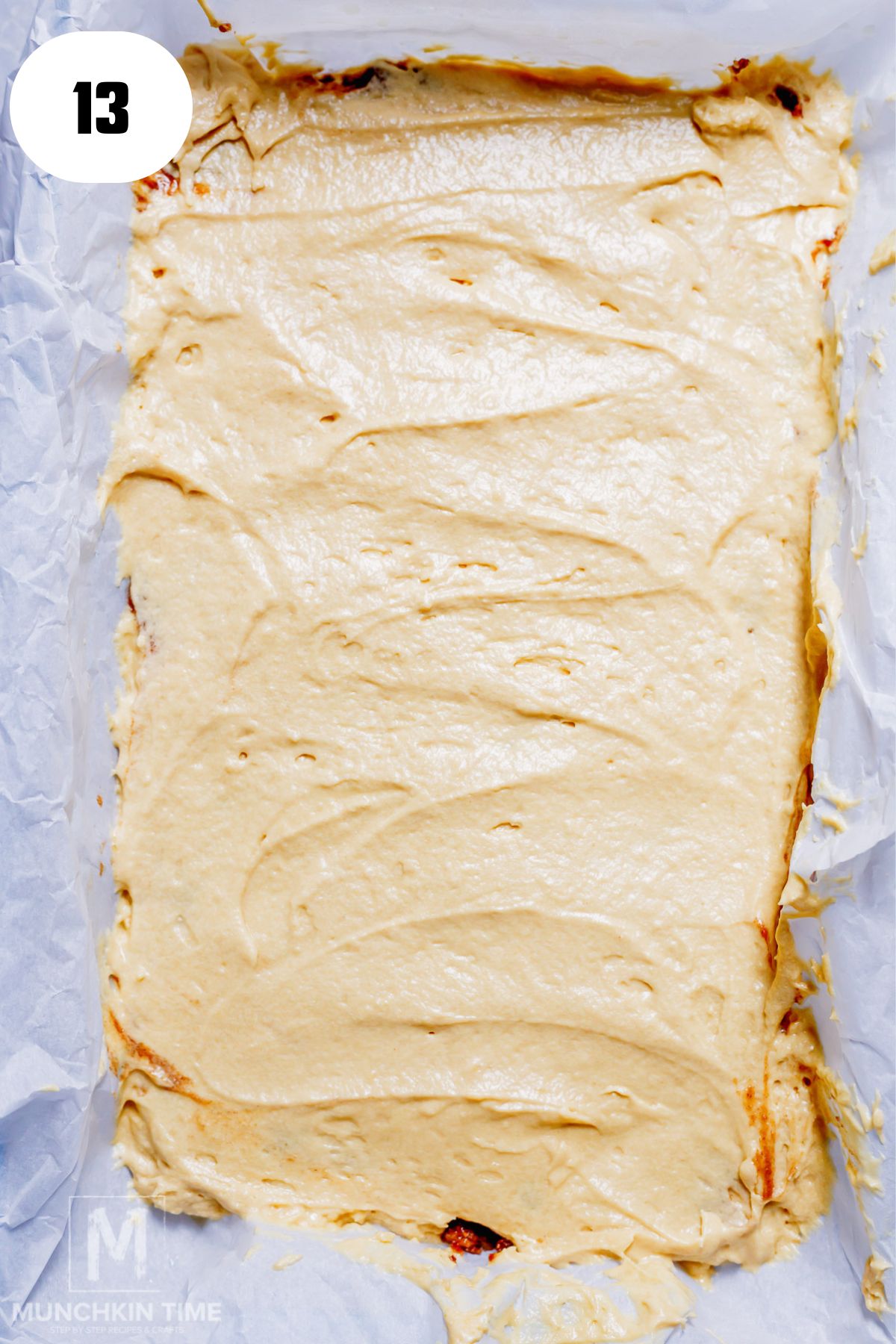 second layer of the cake batter spread over the baking pan.