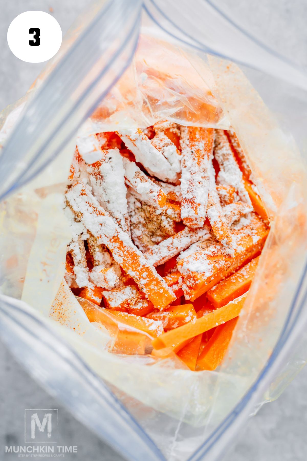 corn starch and spices added to the zip bag with sweet potato strips.