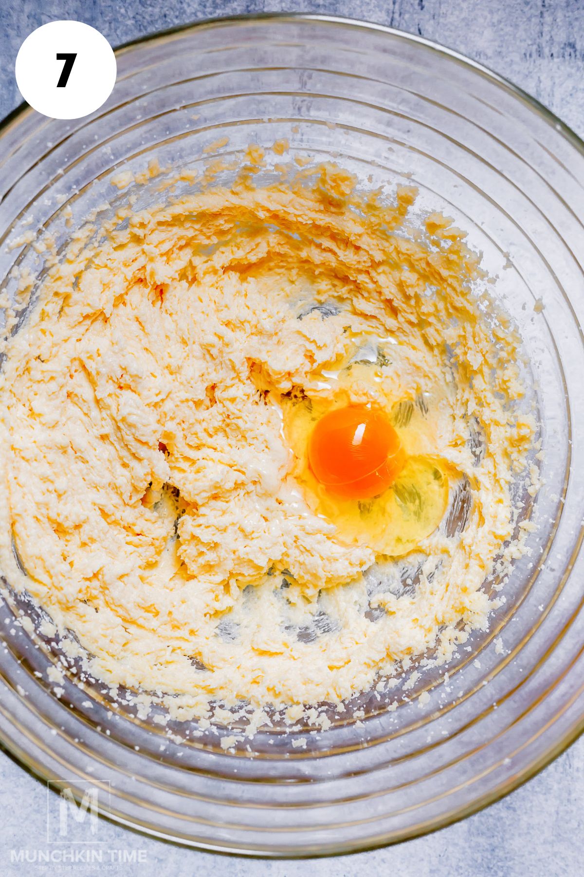 egg added to the bowl with creamed butter.