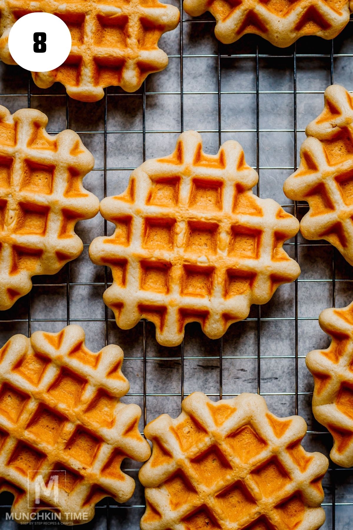 best sourdough discard waffles cooling on a cooling rack.