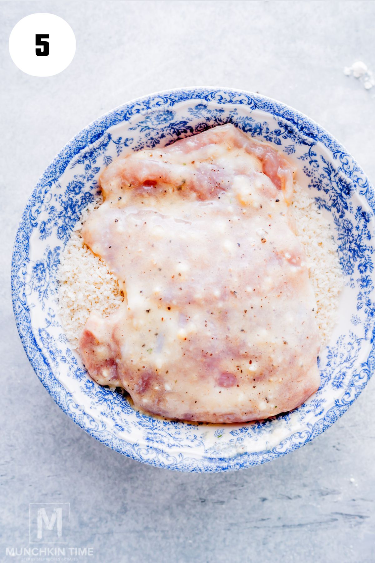 chicken thigh coated in batter and dipped into breadcrumbs.