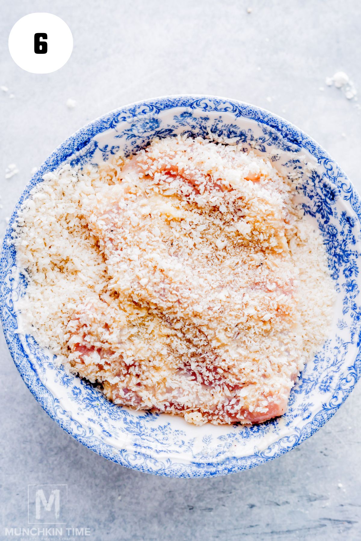 chicken thing coated in breadcrumbs ready for air frying.