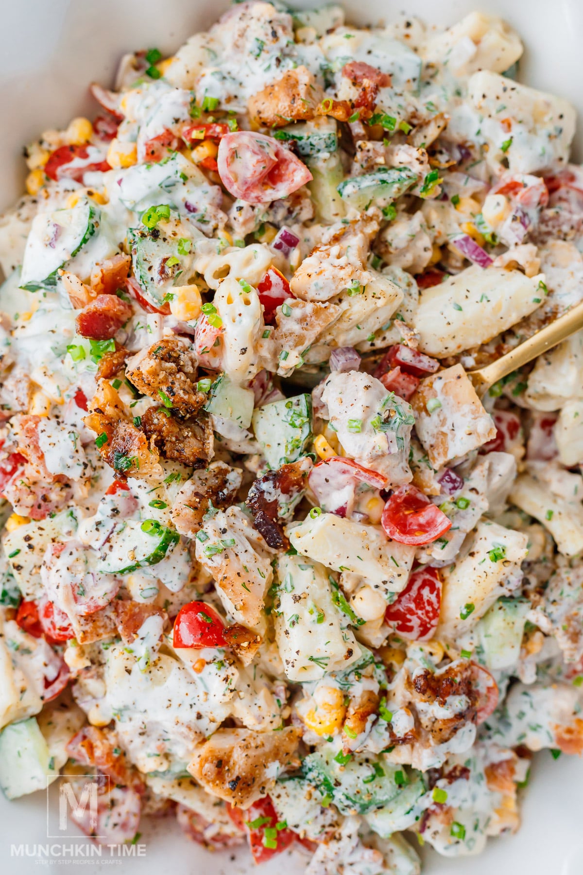Close-up of creamy Chicken Bacon Ranch Pasta Salad with juicy chicken and crispy bacon.