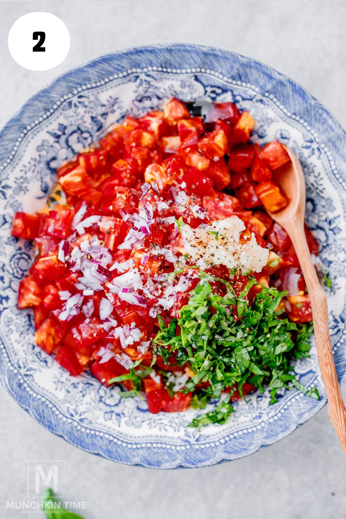 Fresh tomatoes and basil seasoned with salt and black pepper.