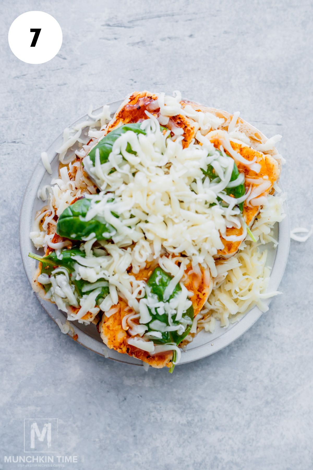 Added shredded mozzarella and golden fried halloumi to the sourdough bread for the ultimate cheesy filling.