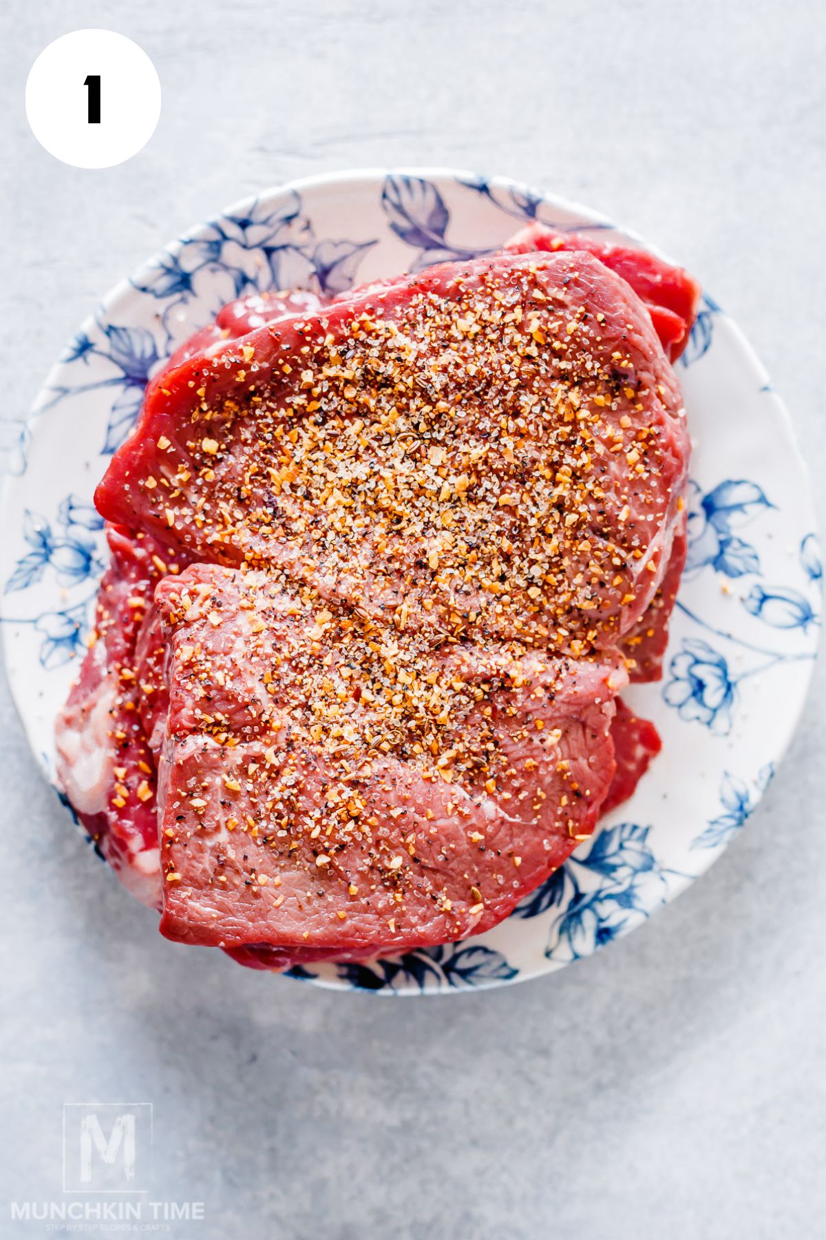 Beef steak seasoned with Montreal steak seasoning before searing