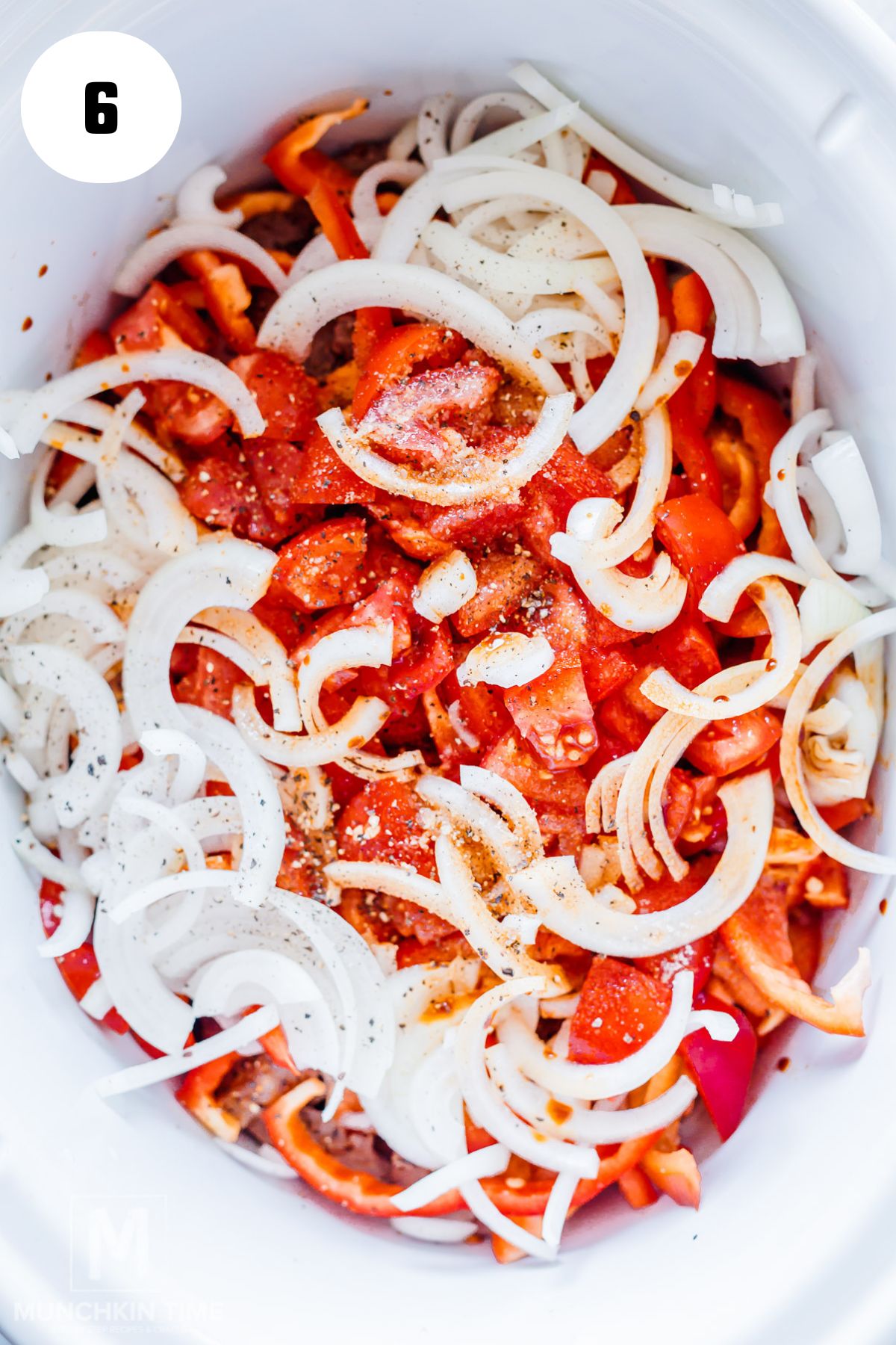 Ingredients for Crock Pot pepper steak in a slow cooker.
