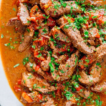 Crock Pot Pepper Steak on a platter.