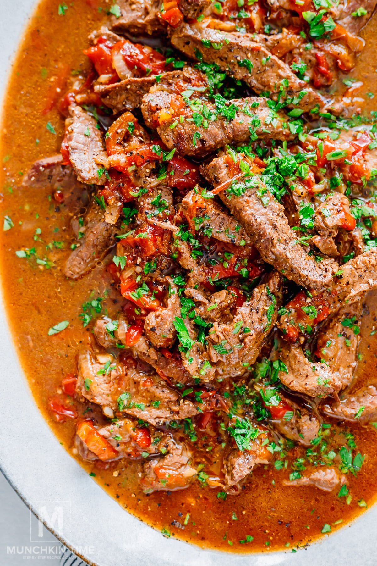Crock Pot Pepper Steak on a platter.