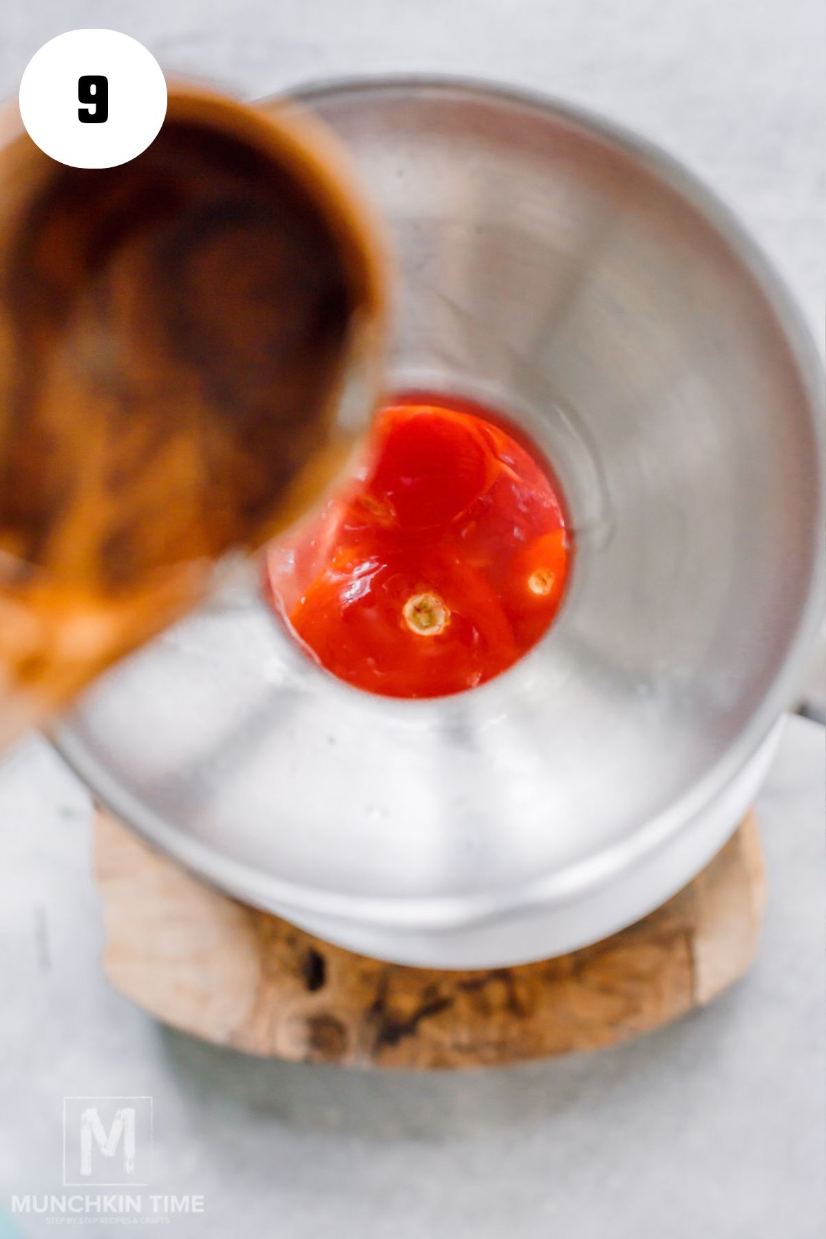 Hot pickling brine poured over Roma tomatoes with garlic dill and onion.