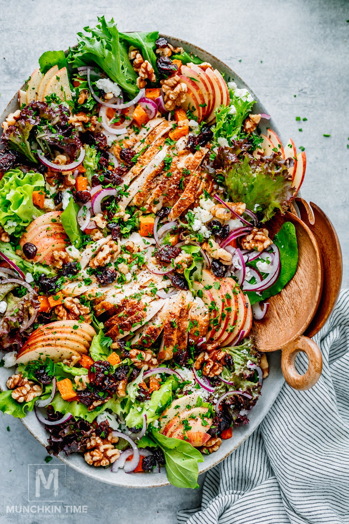Harvest salad with chicken, apples, goat cheese, pecans, cranberries and butternut squash.