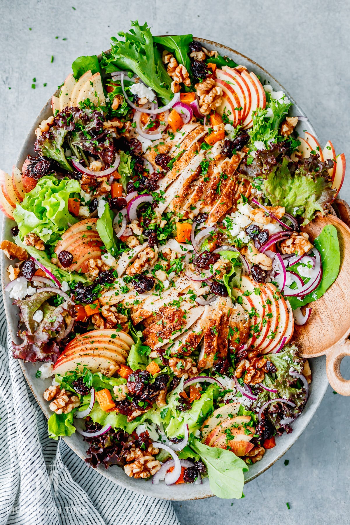 Harvest salad with chicken, apples, goat cheese, pecans, cranberries and butternut squash.