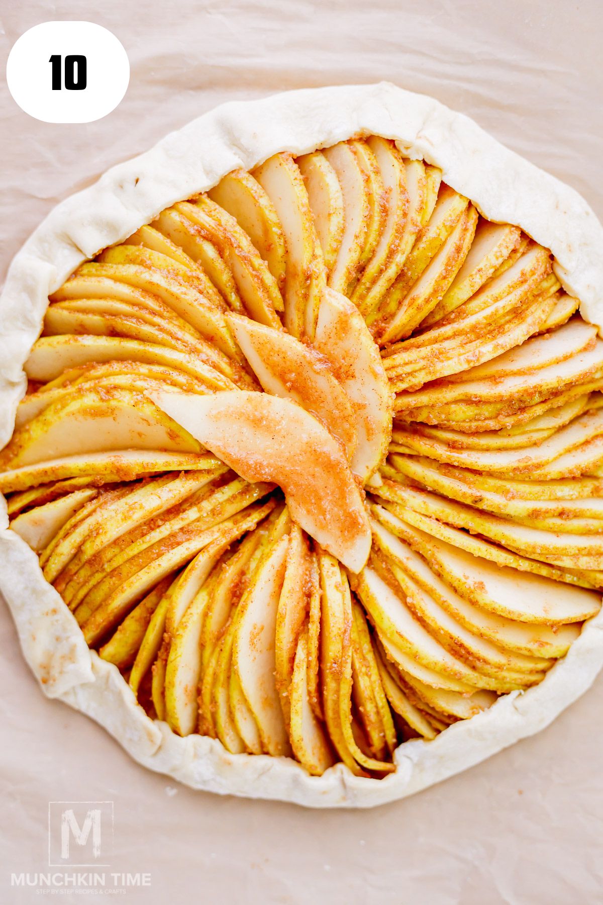 Puff pastry edges folded over sliced pears to create a rustic pear galette.