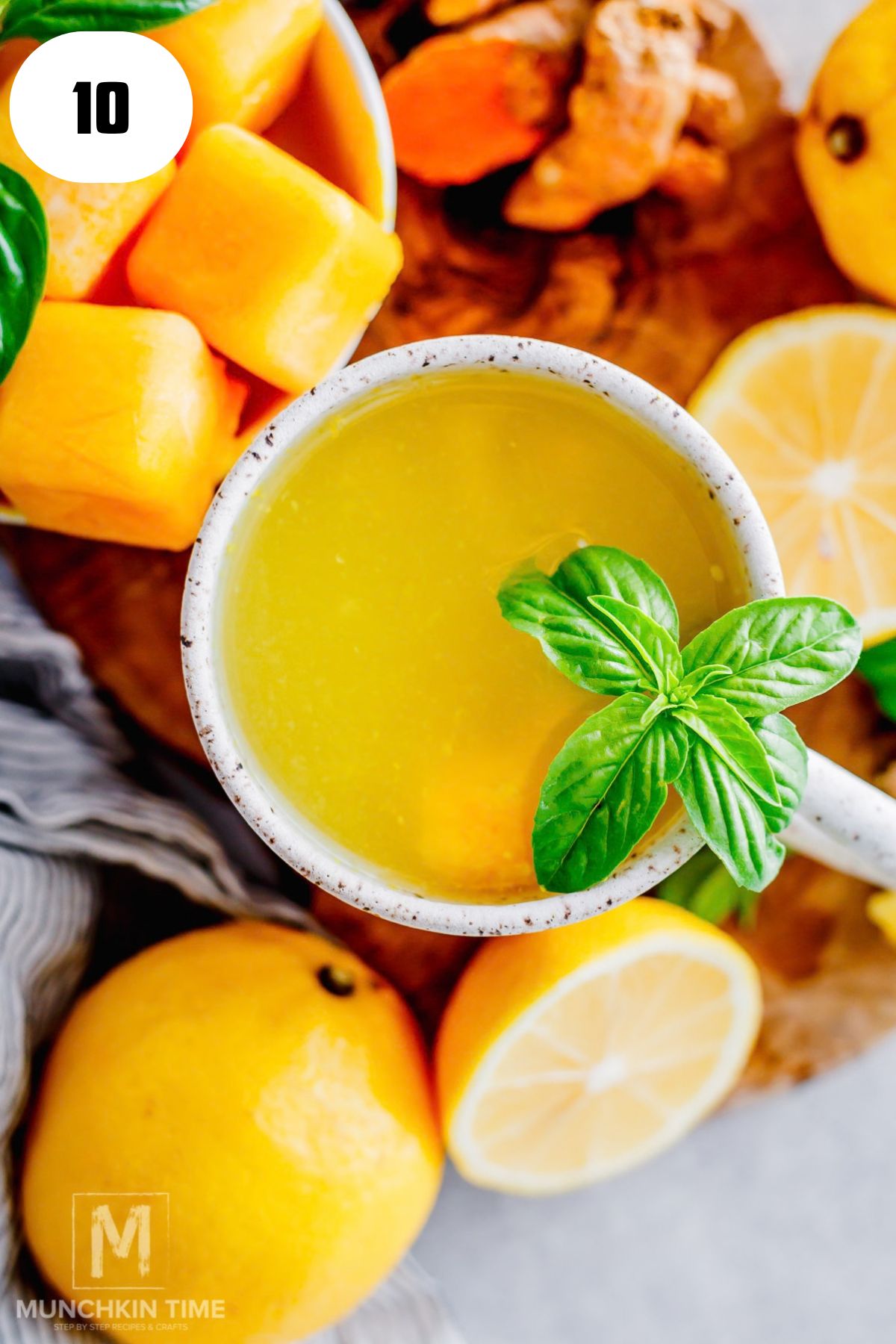 Warm ginger root lemon honey tea made with a frozen pulp cube