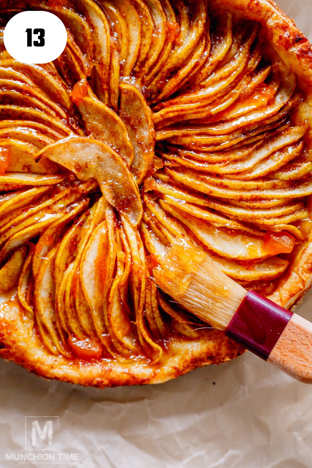 Warm pear galette brushed with apricot glaze and served with vanilla ice cream.