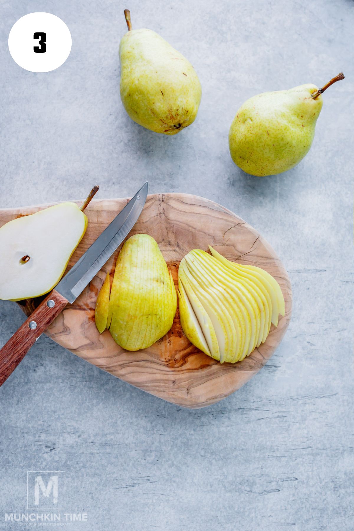 sliced pears on a cutting board