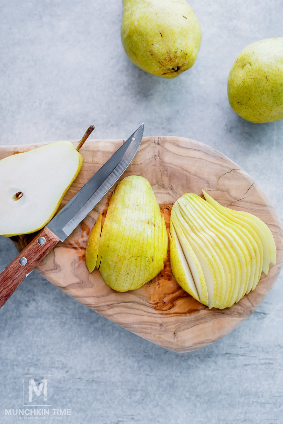 sliced pears on a cutting board